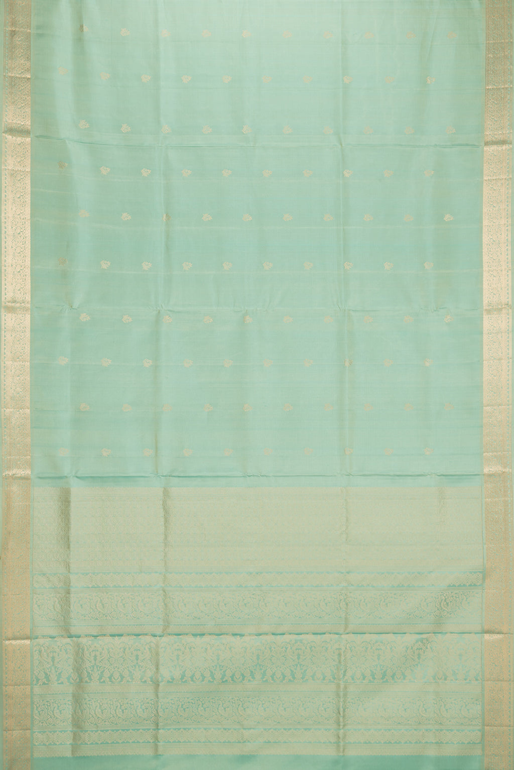 Flat view of Pure Silk Pista Green Soft Saree with Zari Butta on the body and Zari Border. 
