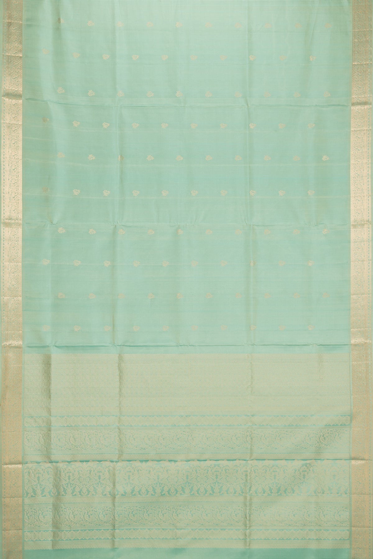 Flat view of Pure Silk Pista Green Soft Saree with Zari Butta on the body and Zari Border. 