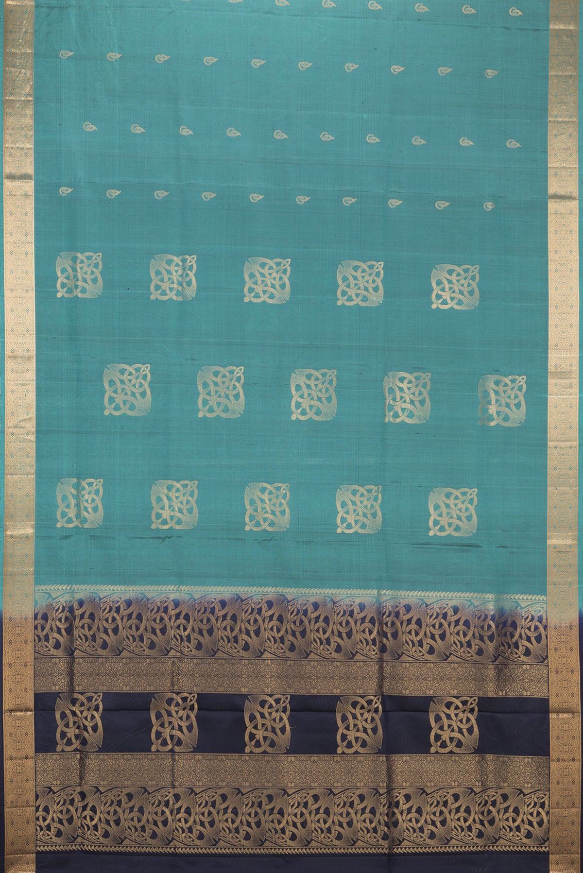 Flat view of Pure Silk Green Soft Saree with Zari Butta on the body and Zari Border. 