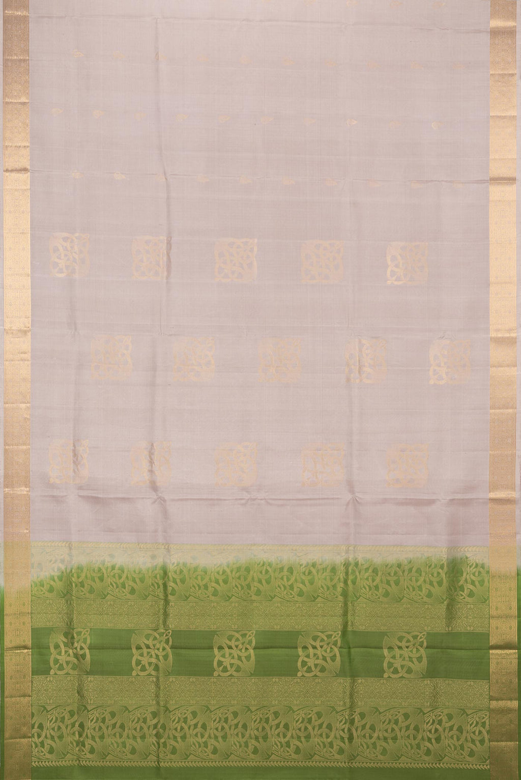 Flat view of Pure Silk Beige Soft Saree with Zari Butta on the body and Zari Border. 