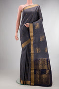 Pure Silk Grey Soft Saree with Zari Butta on the body and Zari Border.  displayed on a mannequin