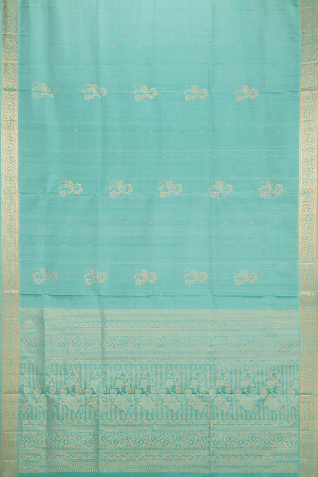 Flat view of Pure Silk Light Green Soft Saree with Zari Butta on the body and Zari Border. 