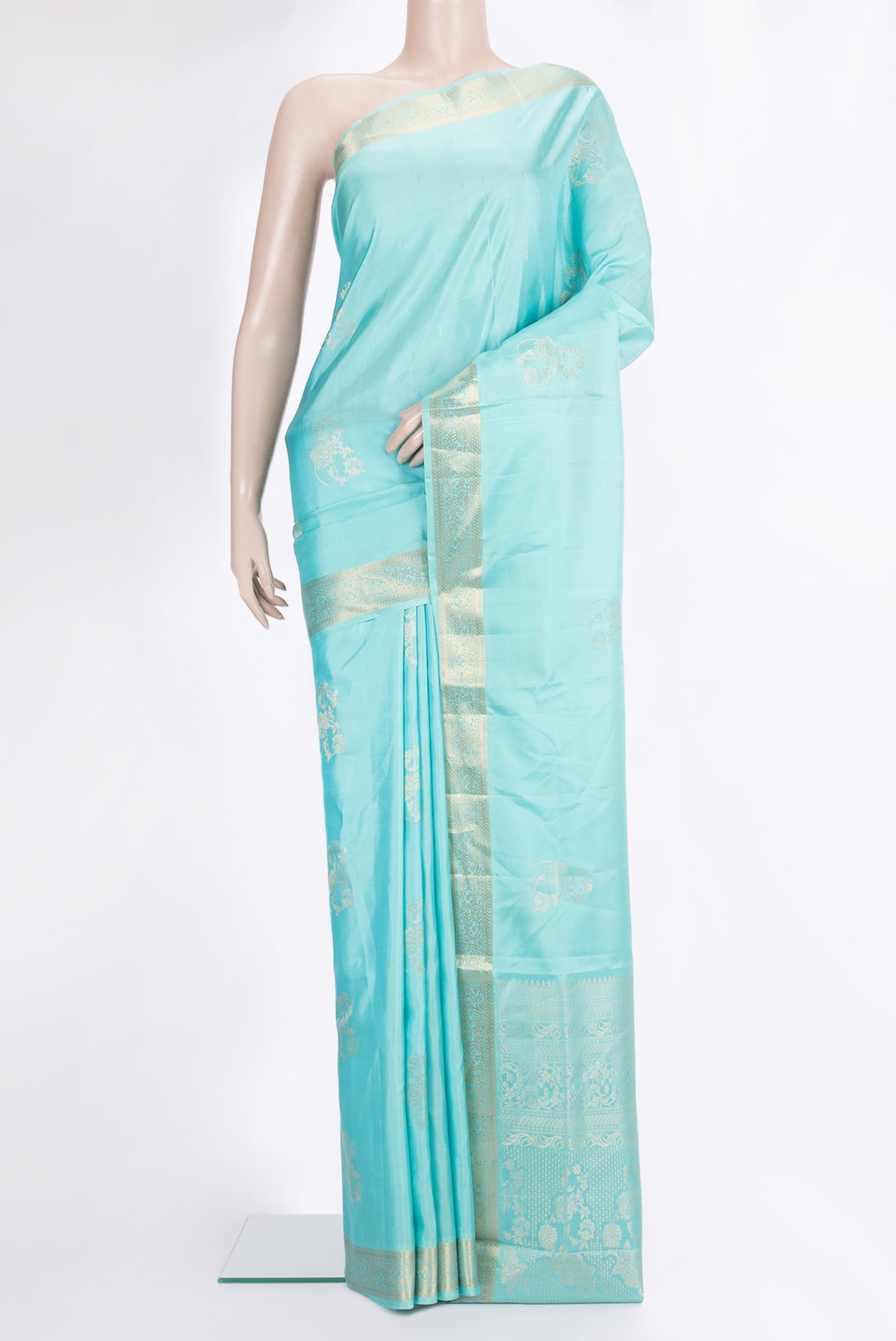 Pure Silk Sky Blue Soft Saree with Zari Butta on the body and Zari Border.  displayed on a mannequin