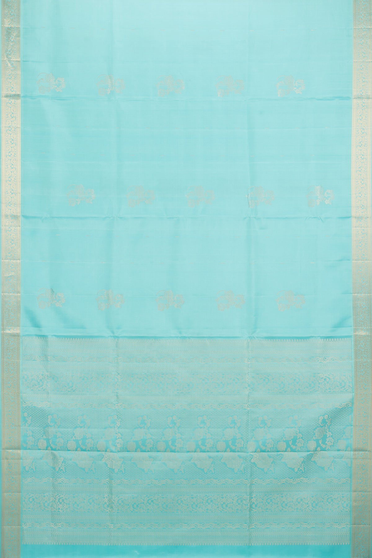 Flat view of Pure Silk Sky Blue Soft Saree with Zari Butta on the body and Zari Border. 