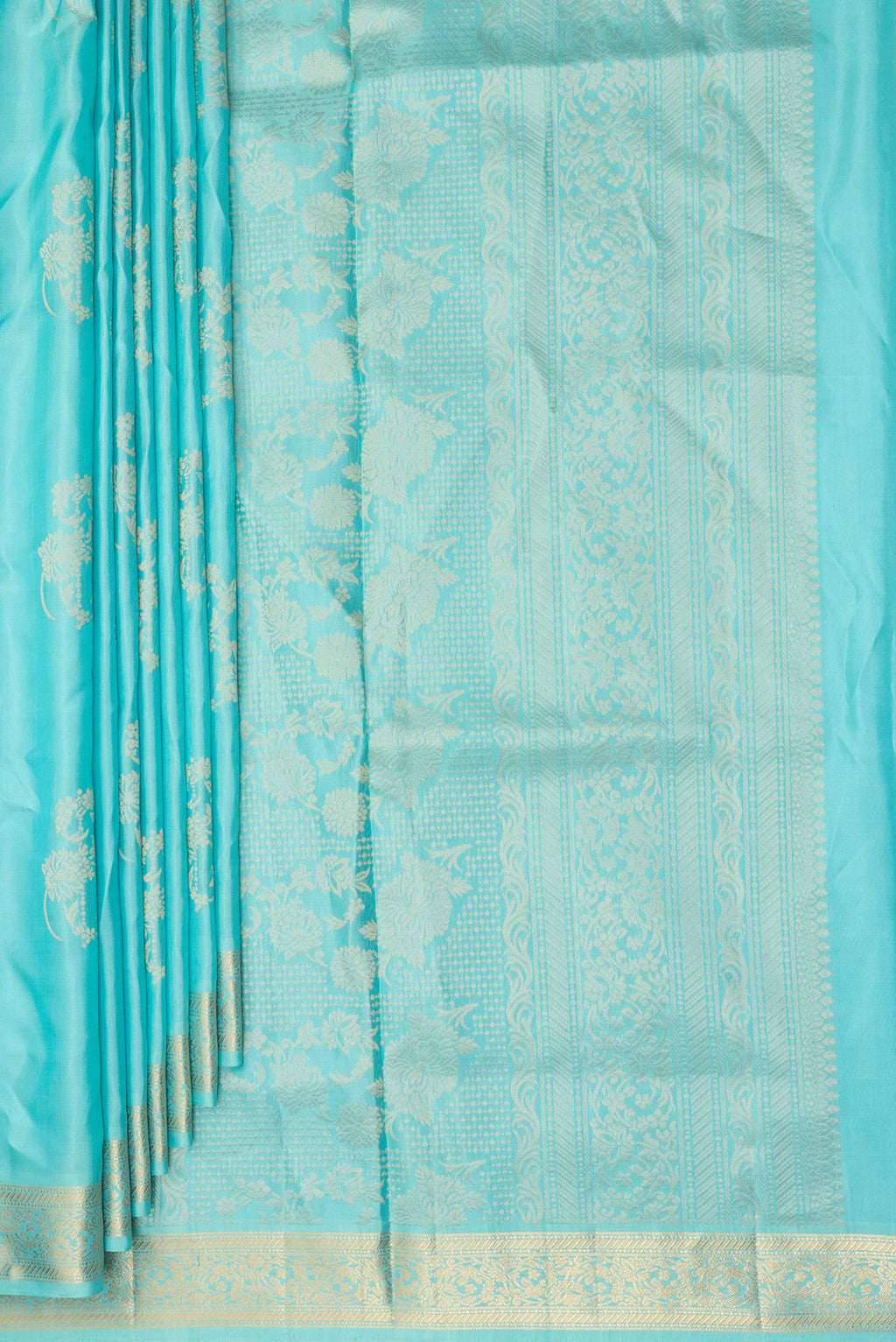 Pleats and pallu of Pure Silk Sky Blue Soft Saree with Zari Butta on the body and Zari Border. 