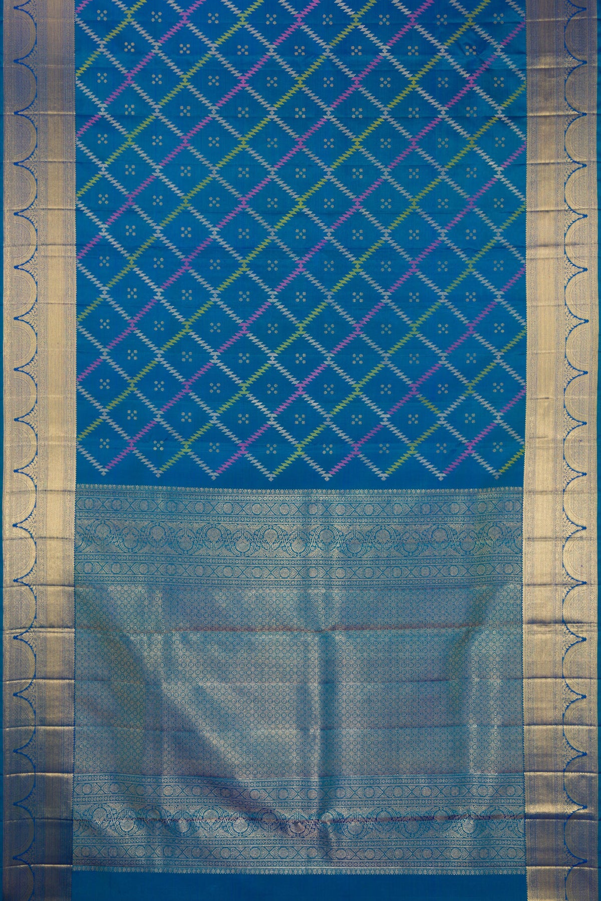 Flat view of Pure Silk Peacock Blue Dual Tone Kanjivaram Saree with Zari Butta on the body and Zari Border. 