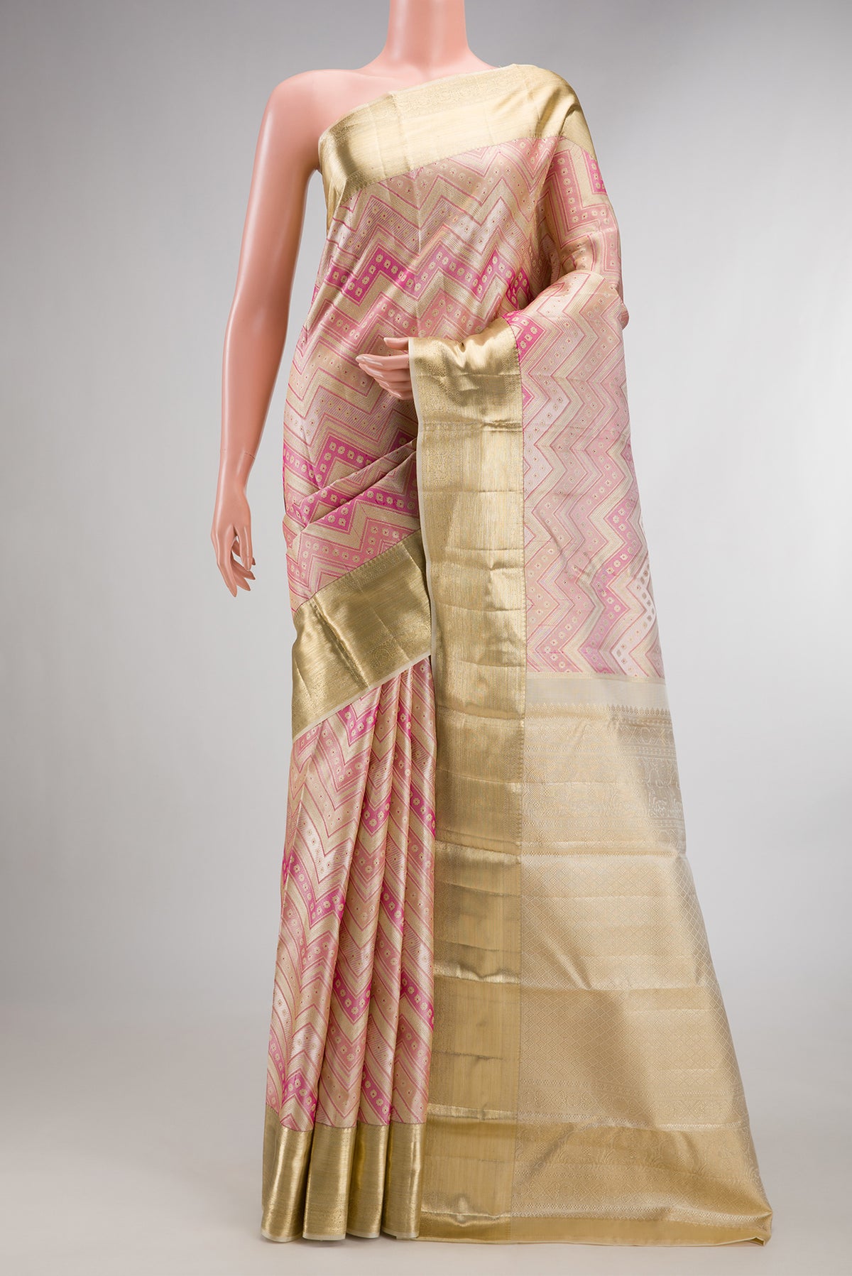 Pure Silk Multi Color Kanjivaram Saree with Zari Brocade on the body and Zari Border.  displayed on a mannequin