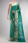 Pure Silk Sea Green Dual Tone Kanjivaram Saree with Zari Brocade on the body and Zari Border.  displayed on a mannequin