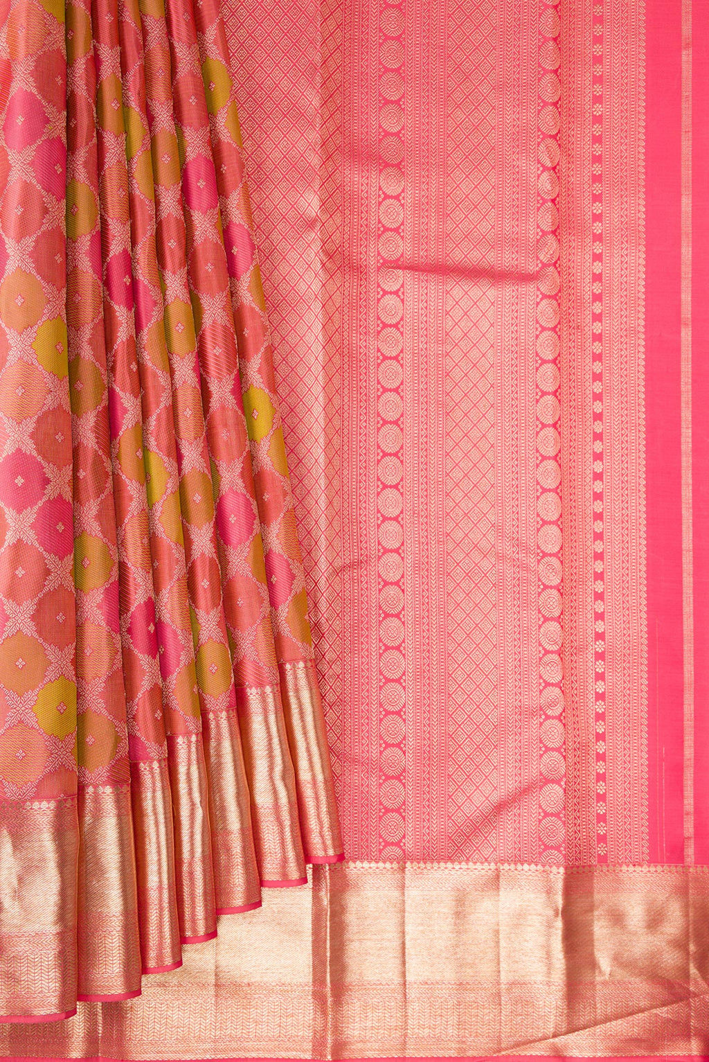 Pleats and pallu of Pure Silk Coral Kanjivaram Saree with Zari Brocade on the body and Zari Border. 