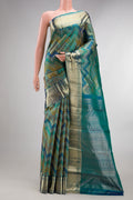 Pure Silk Turquoise Dual Tone Kanjivaram Saree with Zari Brocade on the body and Zari Border.  displayed on a mannequin