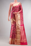 Pure Silk Pink Kanjivaram Saree with Zari Brocade on the body and Zari Border.  displayed on a mannequin