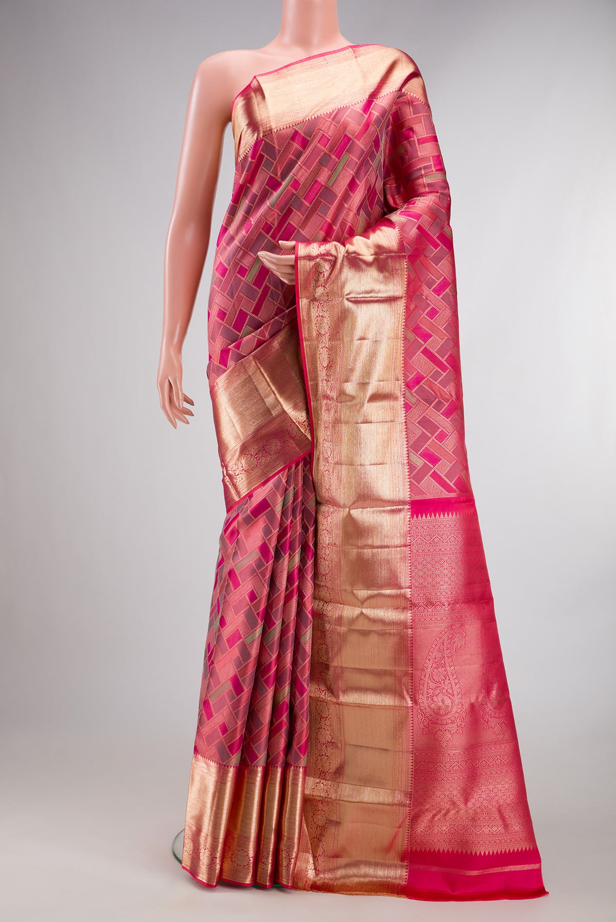 Pure Silk Pink Kanjivaram Saree with Zari Brocade on the body and Zari Border.  displayed on a mannequin