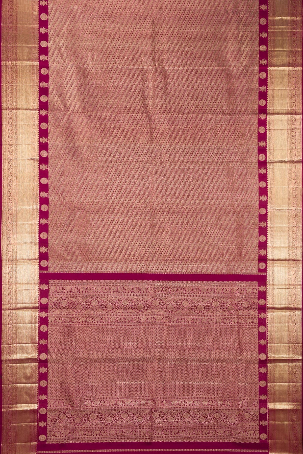 Flat view of Pure Silk Magenta Kanjivaram Saree with Zari Brocade on the body and Fancy Border. 