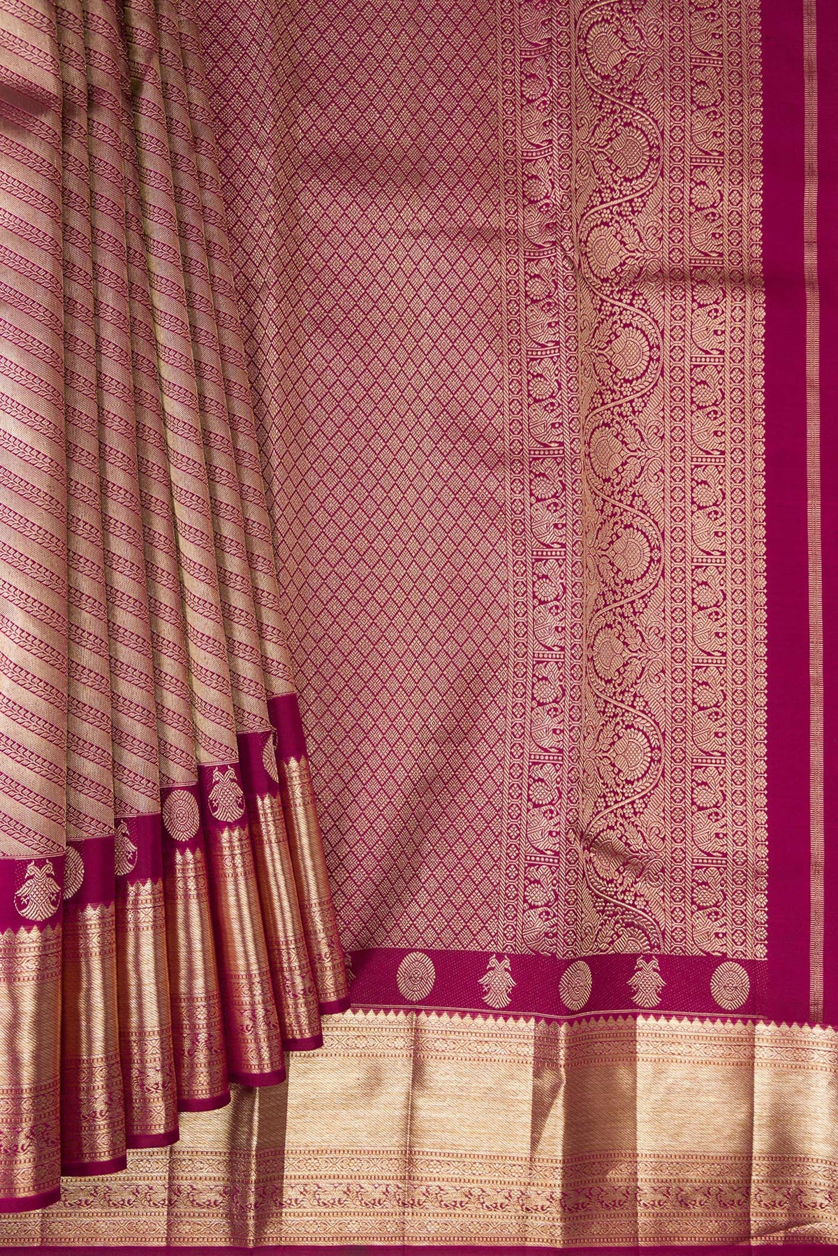 Pleats and pallu of Pure Silk Magenta Kanjivaram Saree with Zari Brocade on the body and Fancy Border. 