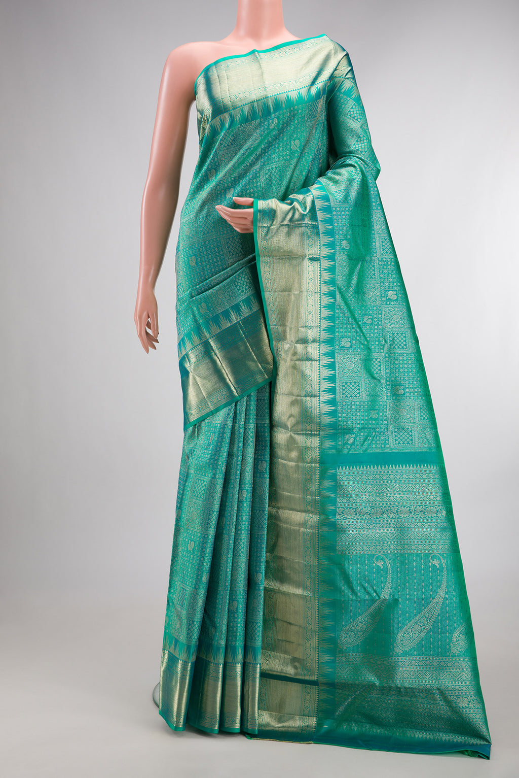 Pure Silk Turquoise Dual Tone Kanjivaram Saree with Zari Brocade on the body and Fancy Border.  displayed on a mannequin