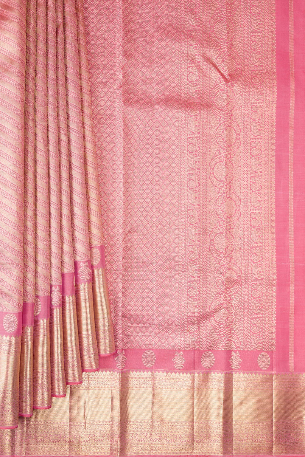 Pleats and pallu of Pure Silk Rose pink Kanjivaram Saree with Zari Brocade on the body and Fancy Border. 