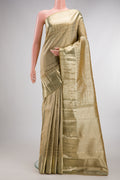 Pure Silk Beige Kanjivaram Saree with Zari Brocade on the body and Fancy Border.  displayed on a mannequin