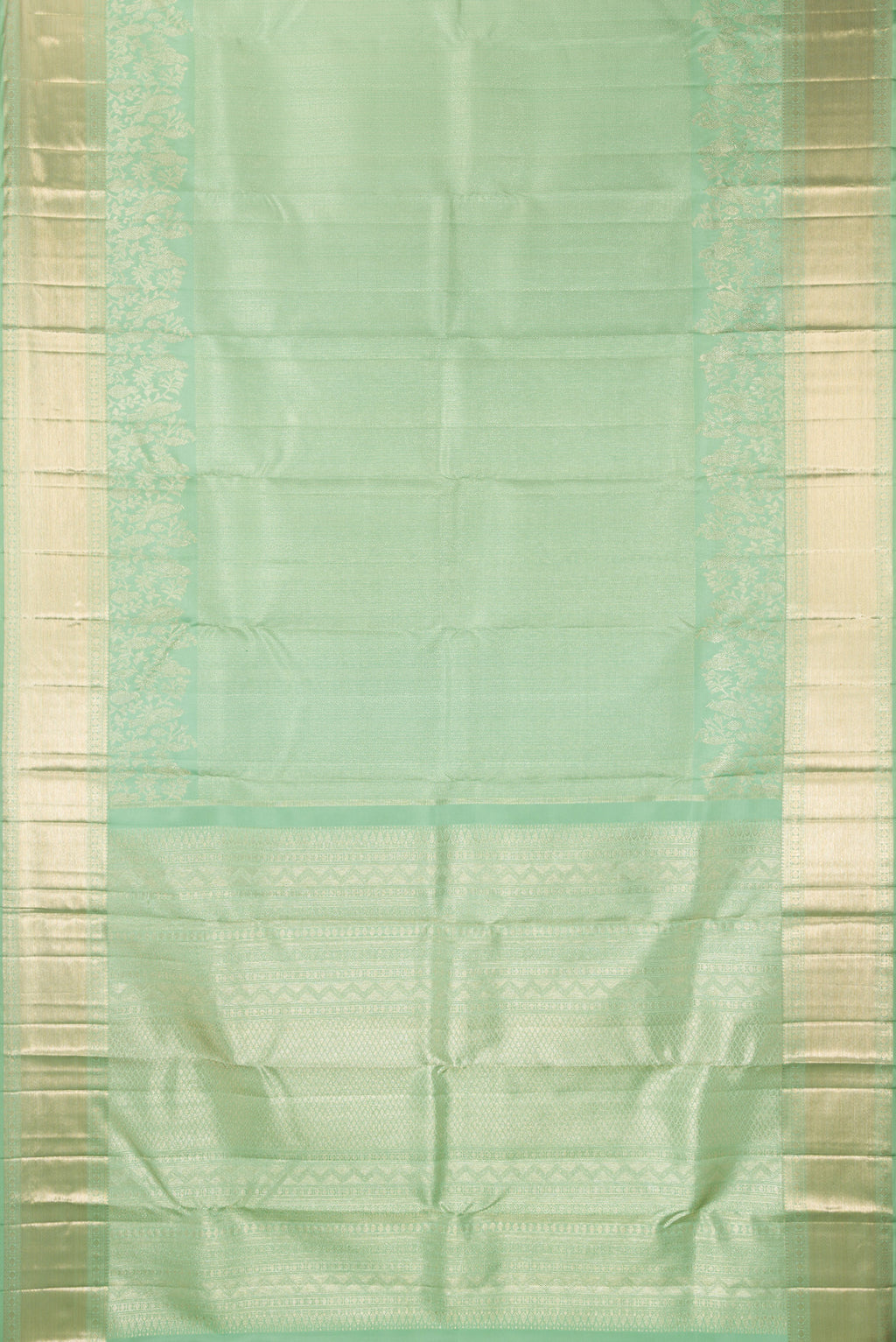 Flat view of Pure Silk Pista Green Kanjivaram Saree with Zari Brocade on the body and Fancy Border. 