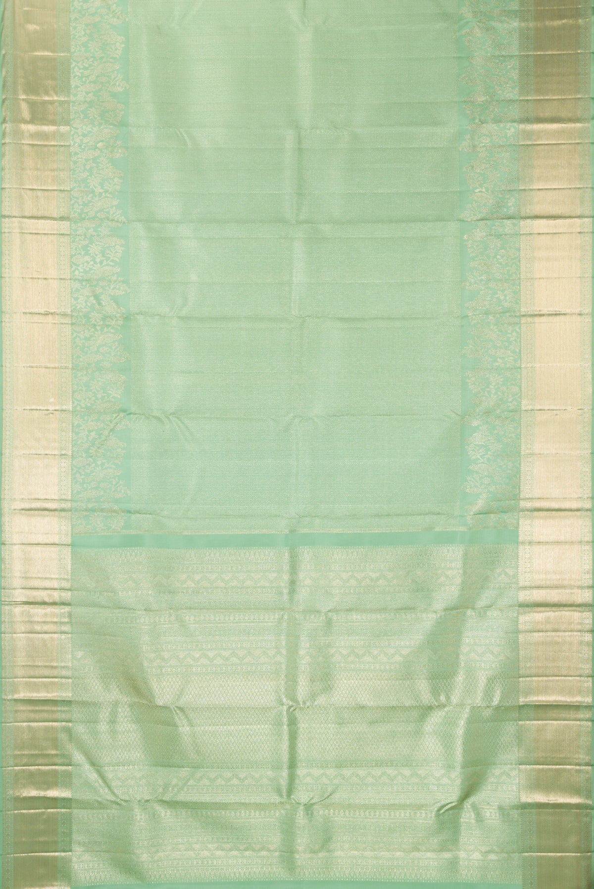 Flat view of Pure Silk Pista Green Kanjivaram Saree with Zari Brocade on the body and Fancy Border. 