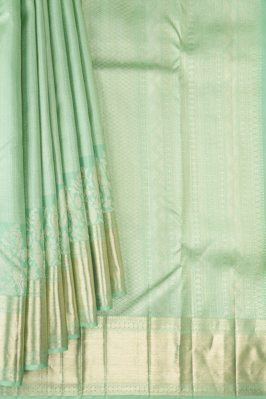 Pleats and pallu of Pure Silk Pista Green Kanjivaram Saree with Zari Brocade on the body and Fancy Border. 