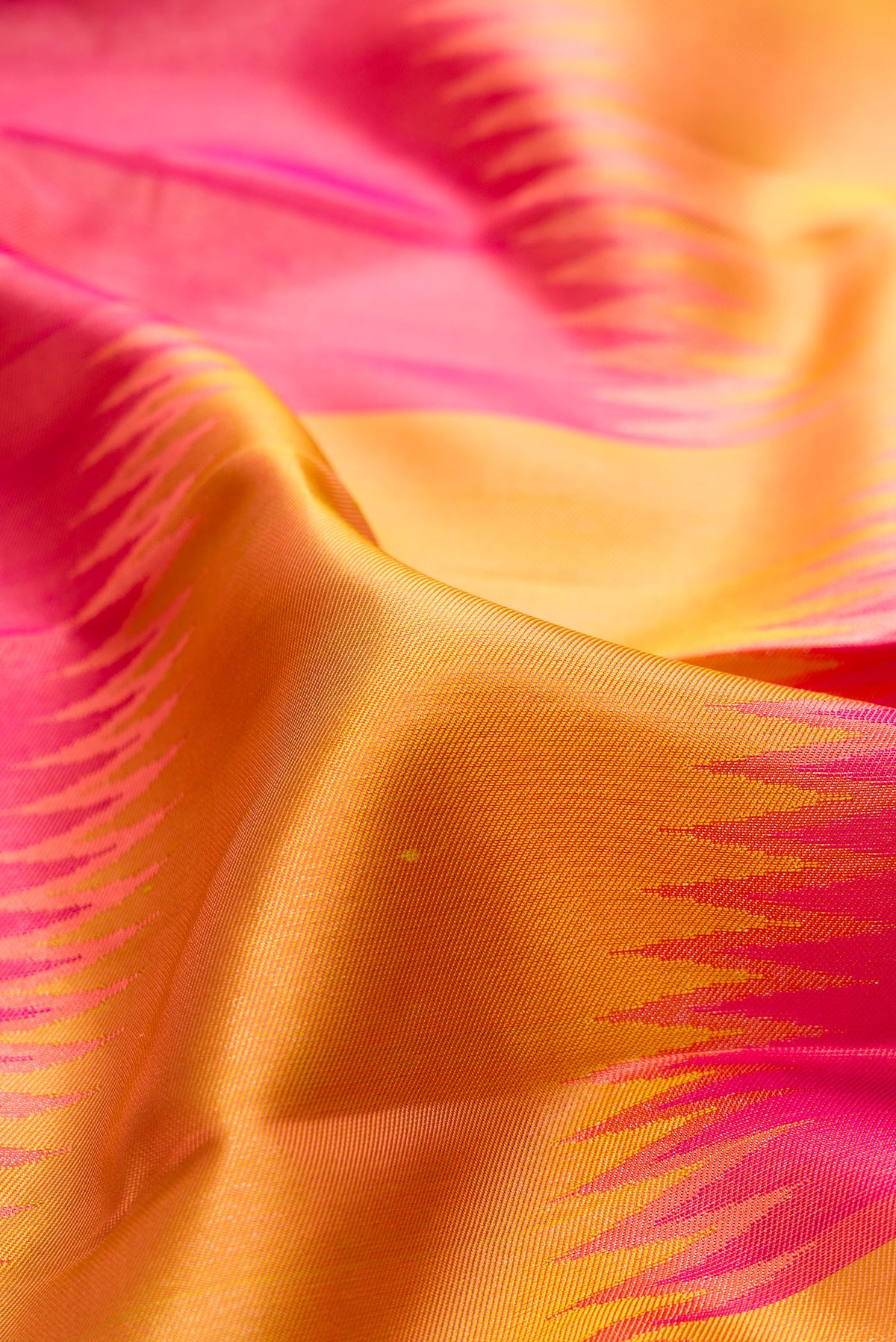 Close up of Pure Silk Multi Color Kanjivaram Saree with Zari Brocade on the body and Zari Border.  displaying folds