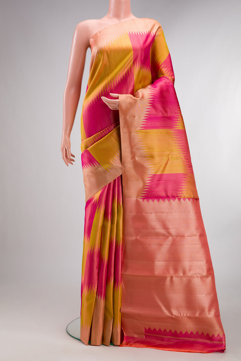 Pure Silk Multi Color Kanjivaram Saree with Zari Brocade on the body and Zari Border.  displayed on a mannequin