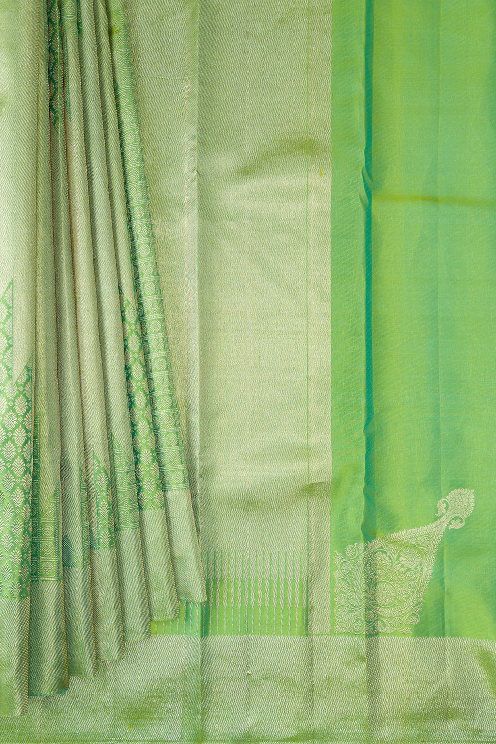 Pleats and pallu of Pure Silk Light Green Kanjivaram Saree with Zari Brocade on the body and Zari Border. 
