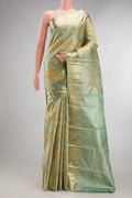 Pure Silk Light Green Dual Tone Kanjivaram Saree with Zari Brocade on the body and Zari Border.  displayed on a mannequin