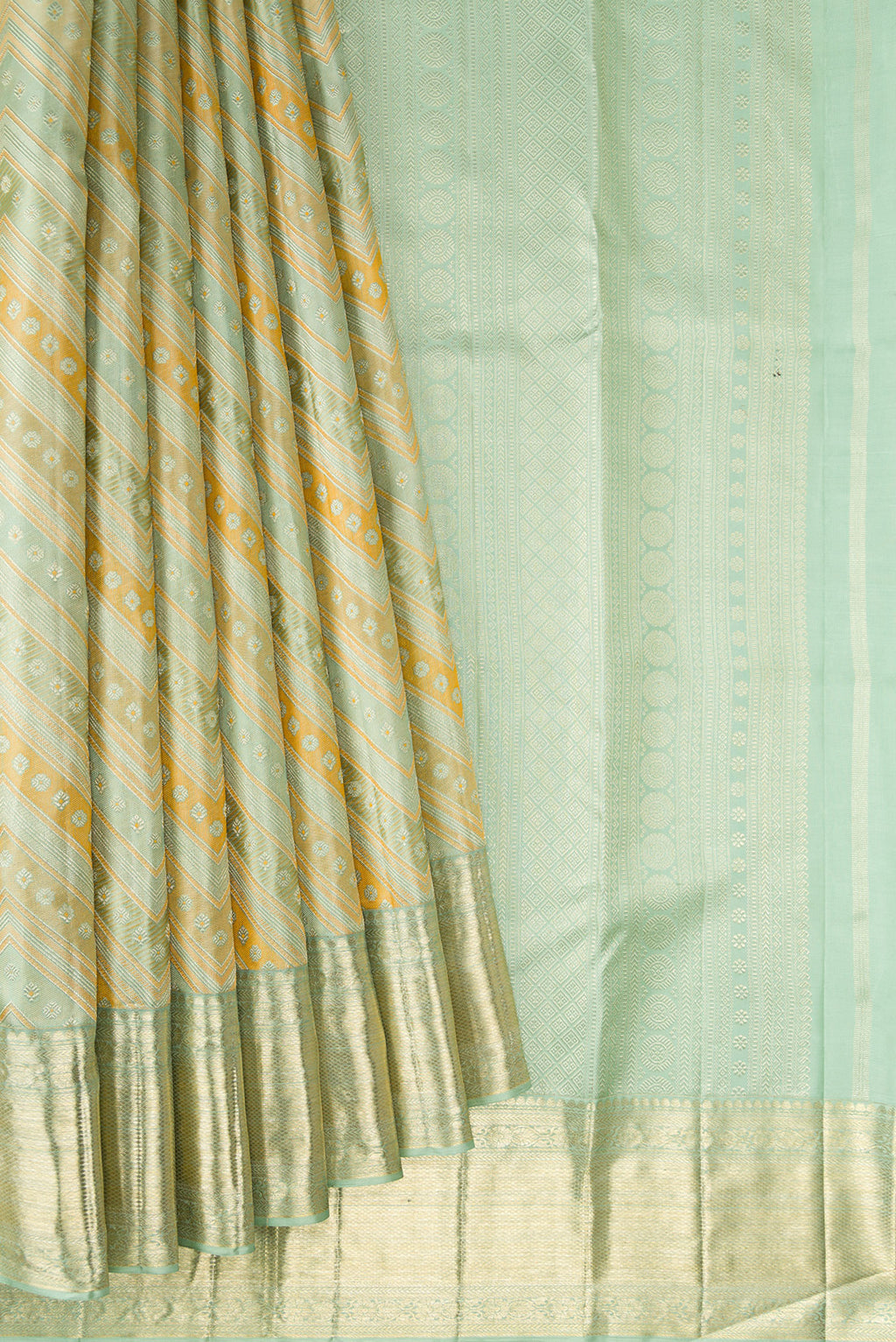 Pleats and pallu of Pure Silk Light Green Dual Tone Kanjivaram Saree with Zari Brocade on the body and Zari Border. 