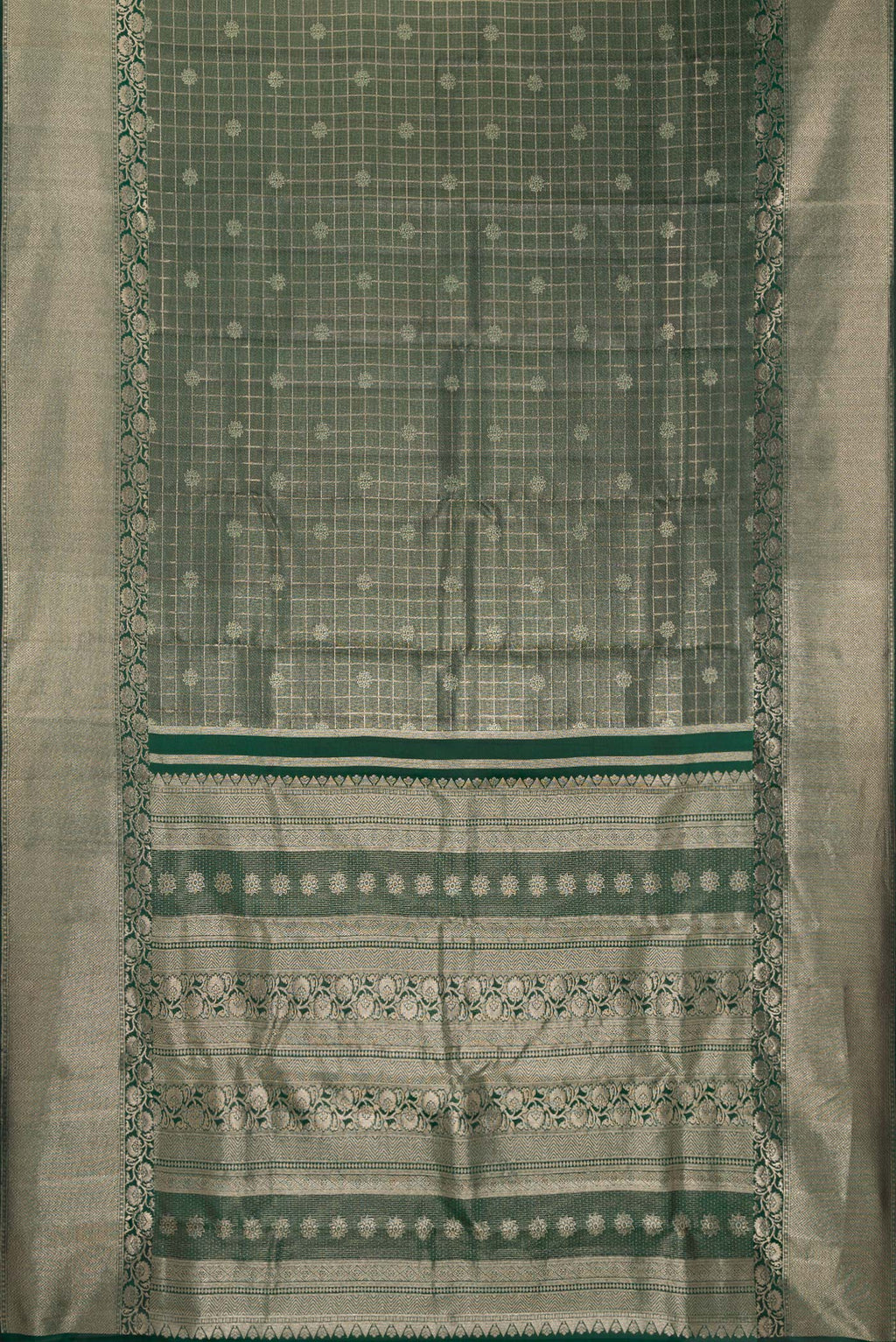 Flat view of Bottle Green Dual Tone Kanchipuram Tissue Saree with Zari Brocade on the body and Zari Border. 