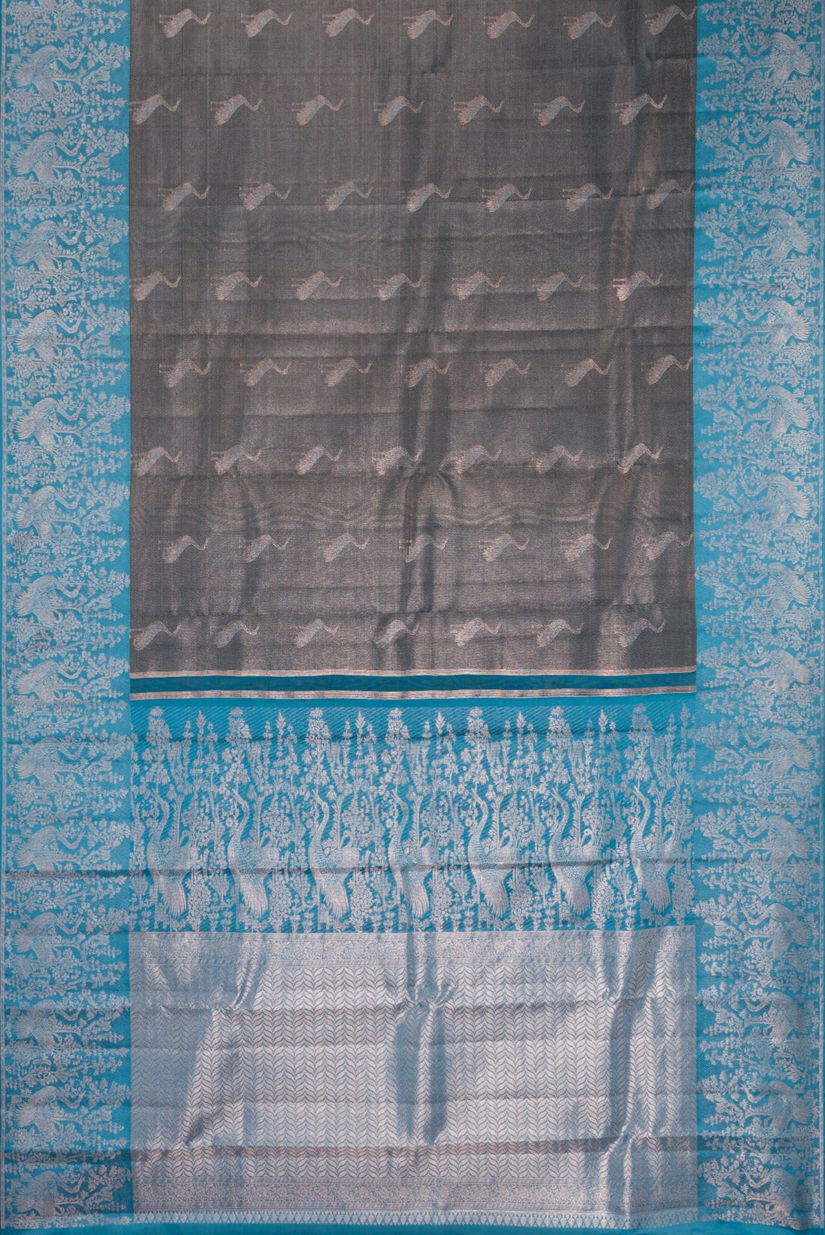 Flat view of Grey Dual Tone Kanchipuram Tissue Saree with Zari Brocade on the body and Fancy Border. 