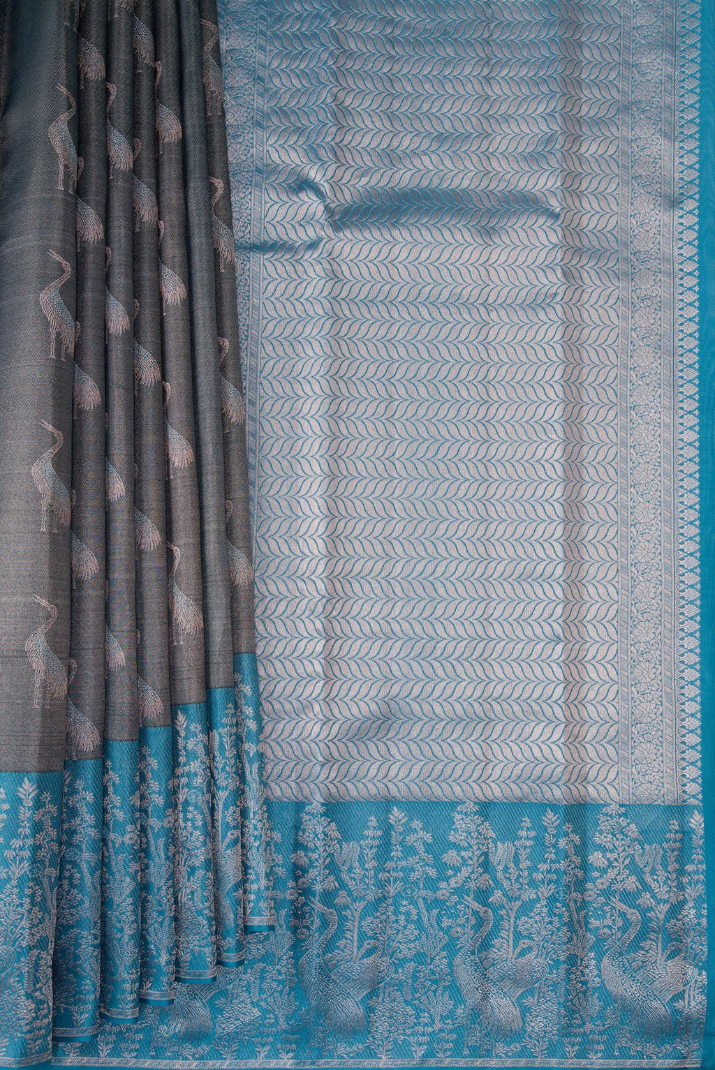 Pleats and pallu of Grey Dual Tone Kanchipuram Tissue Saree with Zari Brocade on the body and Fancy Border. 