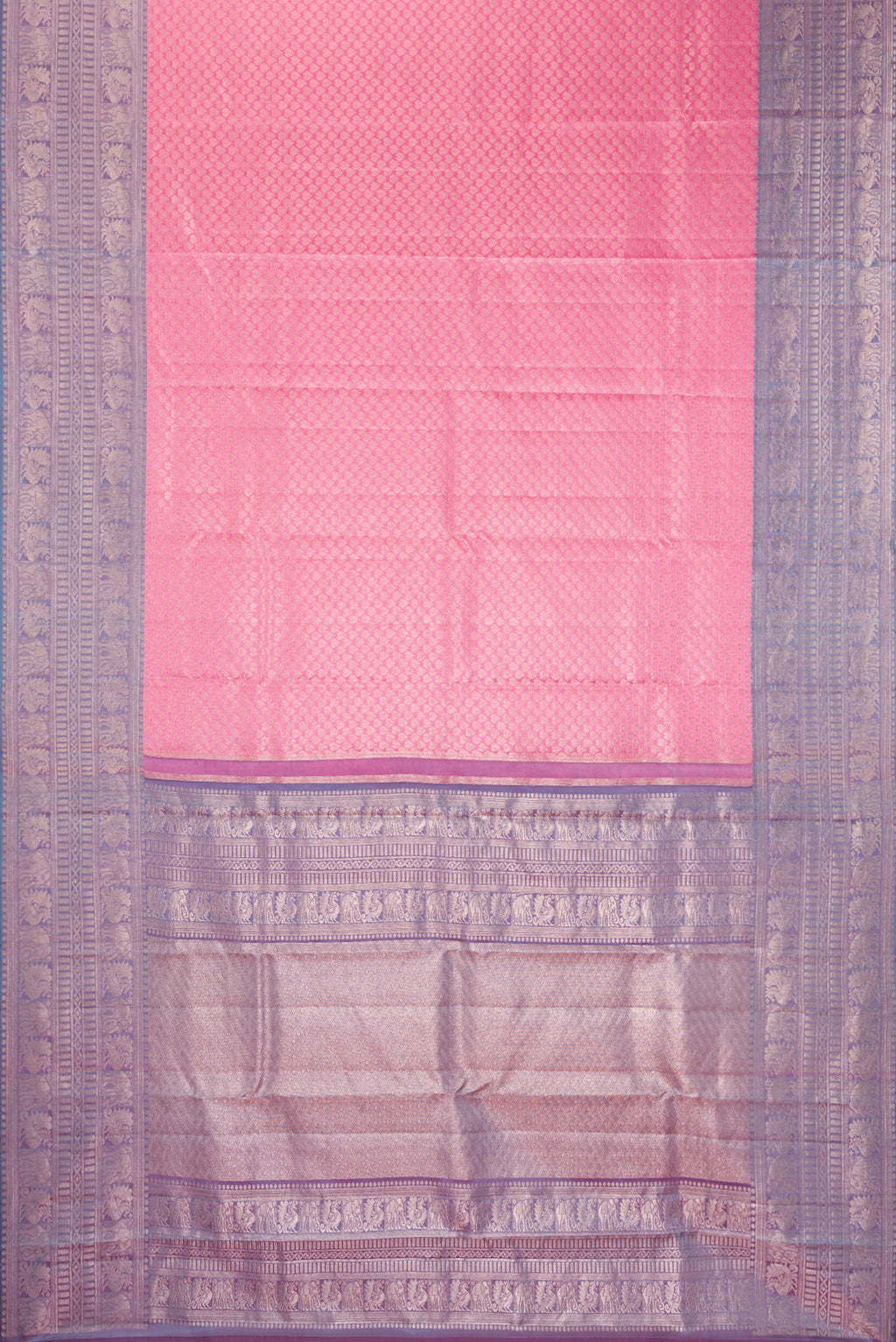 Flat view of Rose pink Kanchipuram Tissue Saree with Zari Brocade on the body and Fancy Border. 