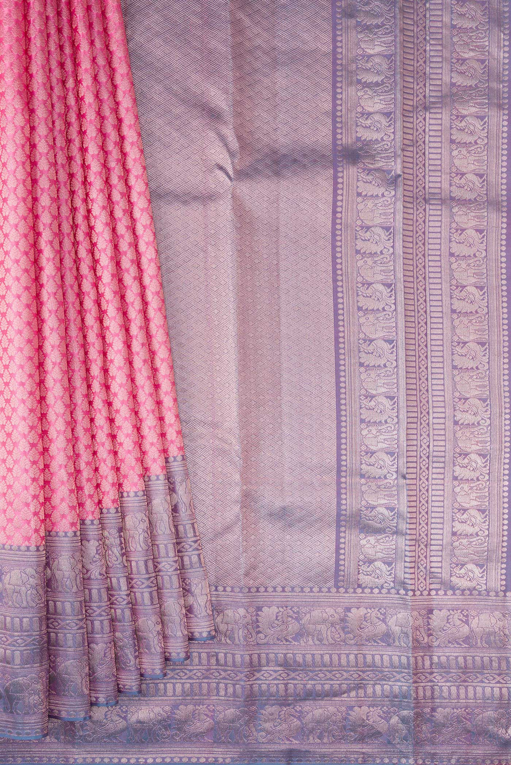 Pleats and pallu of Rose pink Kanchipuram Tissue Saree with Zari Brocade on the body and Fancy Border. 