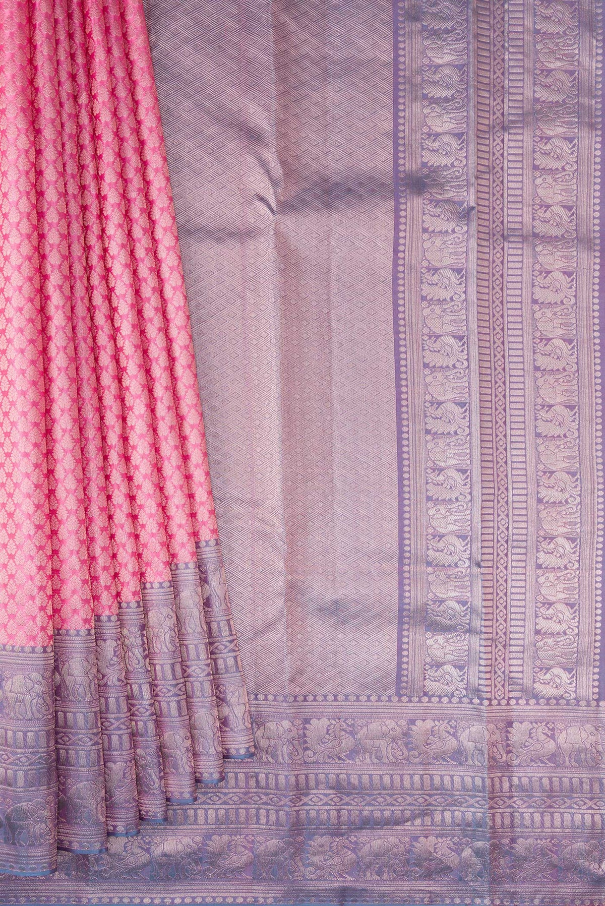 Pleats and pallu of Rose pink Kanchipuram Tissue Saree with Zari Brocade on the body and Fancy Border. 
