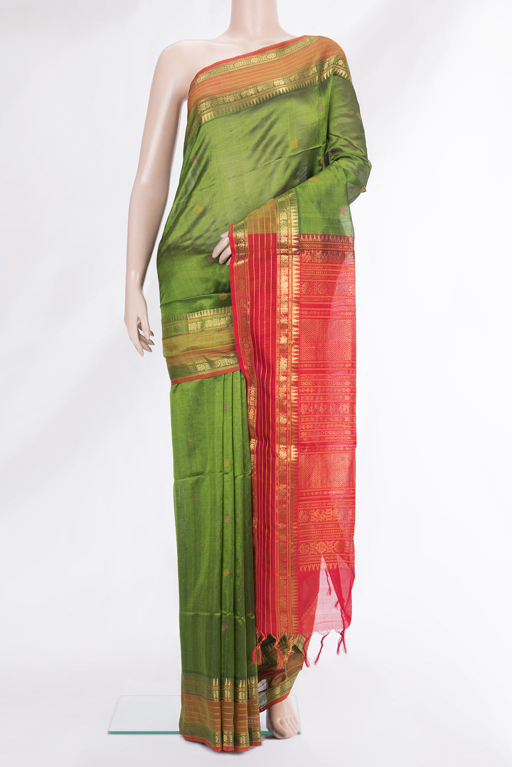 Green Silk Cotton Saree with Thread Butta on the body and Zari Border.  displayed on a mannequin