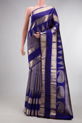 Pure Silk Royal Blue Dual Tone Kanchipuram Saree with Zari Brocade on the body and Temple Border.  displayed on a mannequin