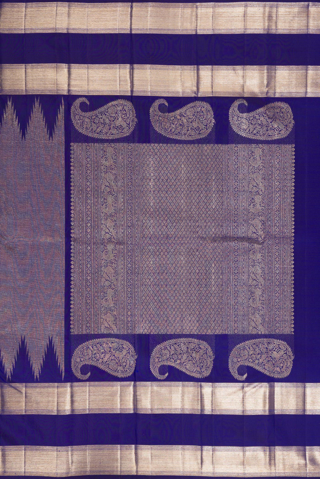 Close up image of the pallu of Pure Silk Royal Blue Dual Tone Kanchipuram Saree with Zari Brocade on the body and Temple Border. 