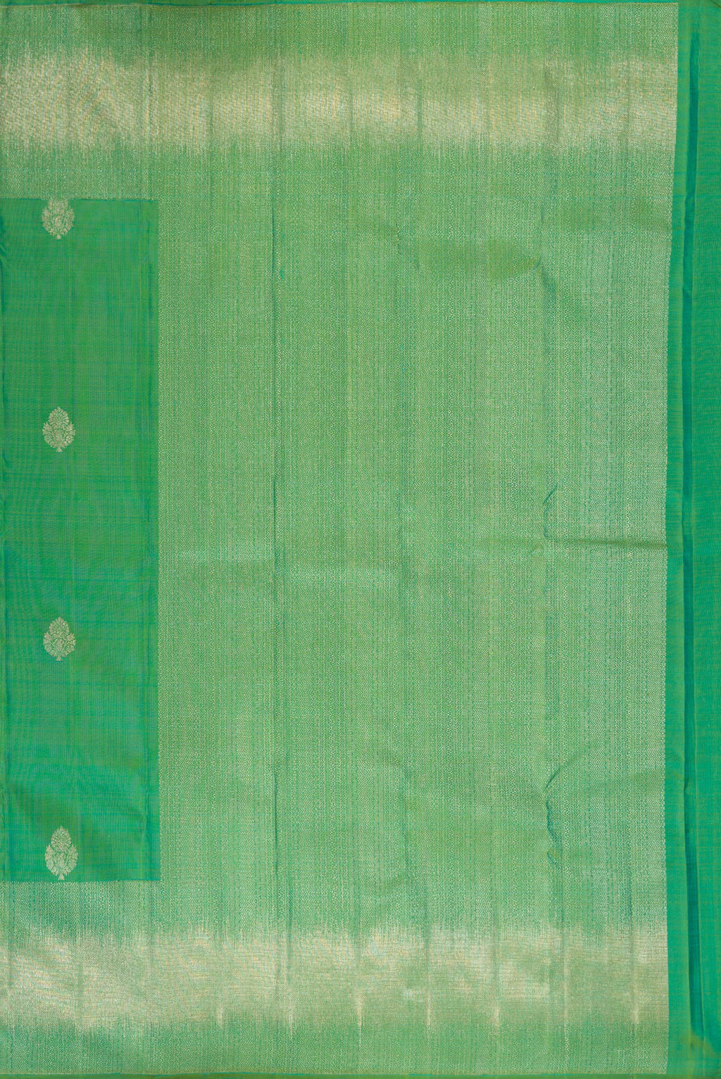 Close up image of the pallu of Pure Silk Green Dual Tone Kanjivaram Saree with Zari Butta on the body and Fancy Border. 