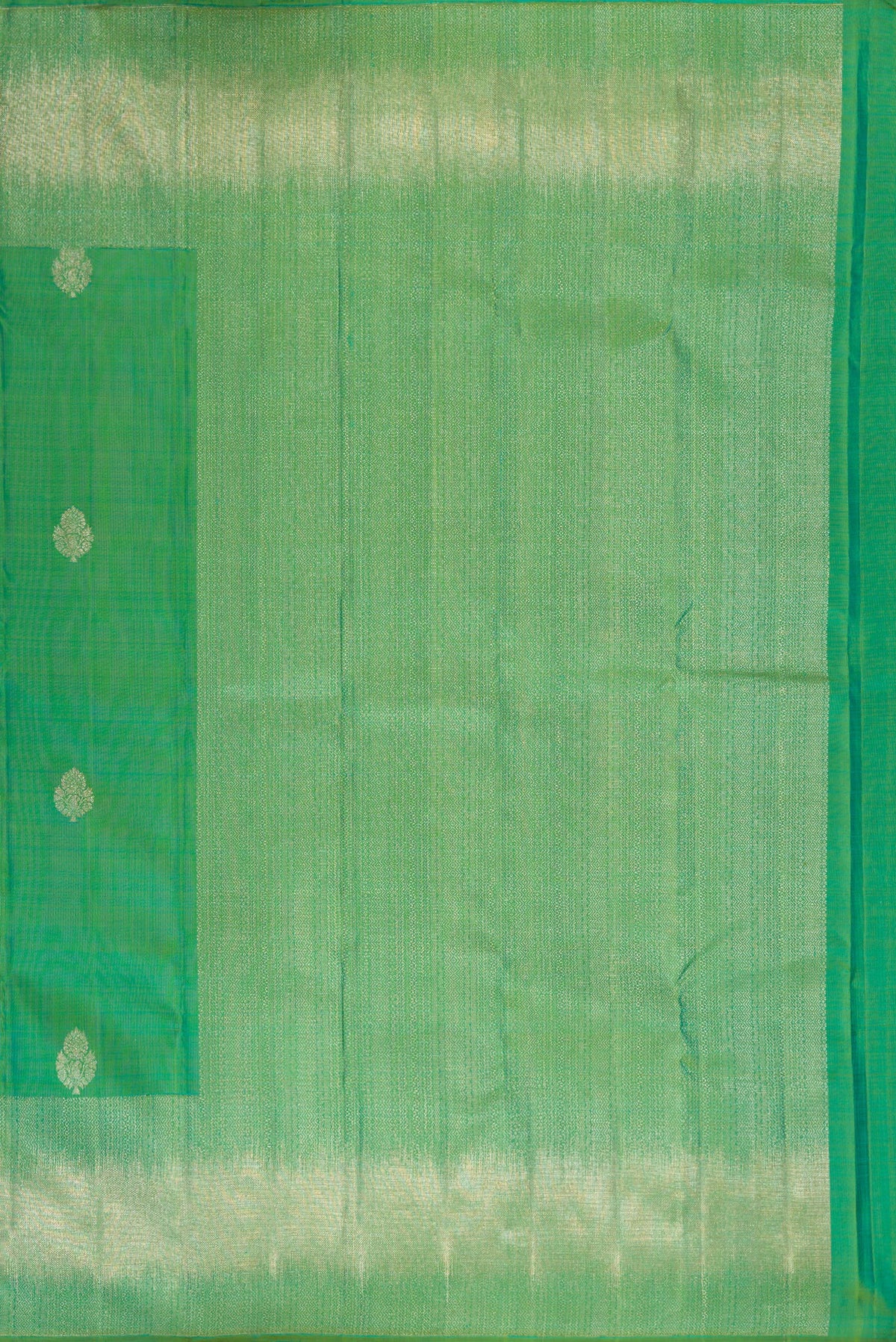 Close up image of the pallu of Pure Silk Green Dual Tone Kanjivaram Saree with Zari Butta on the body and Fancy Border. 