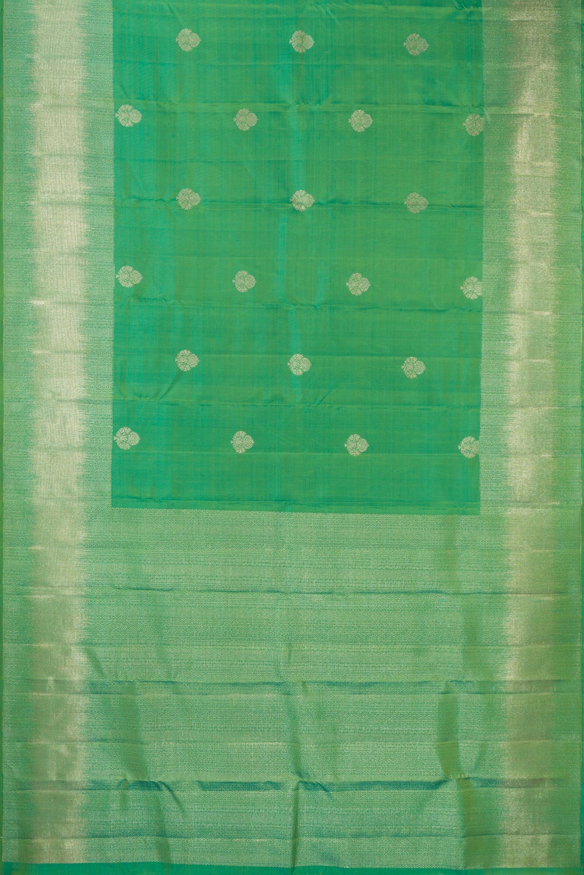 Flat view of Pure Silk Green Dual Tone Kanjivaram Saree with Zari Butta on the body and Fancy Border. 
