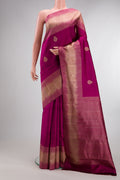 Pure Silk Magenta Dual Tone Kanjivaram Saree with Zari Butta on the body and Fancy Border.  displayed on a mannequin