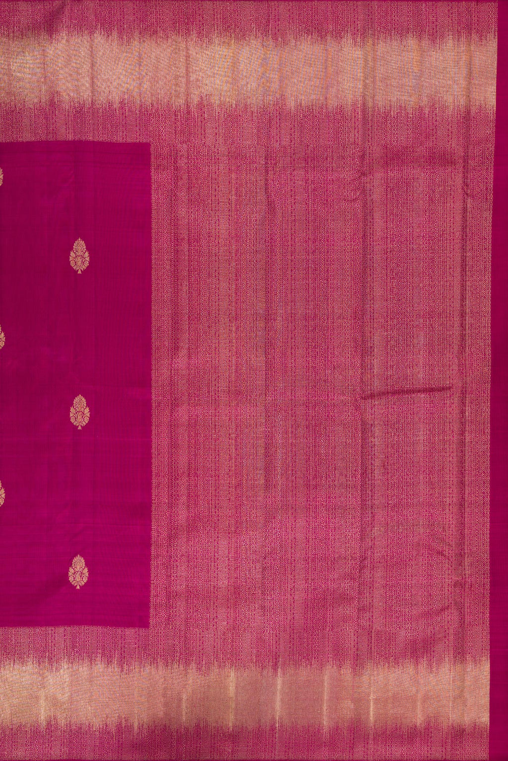 Close up image of the pallu of Pure Silk Magenta Dual Tone Kanjivaram Saree with Zari Butta on the body and Fancy Border. 