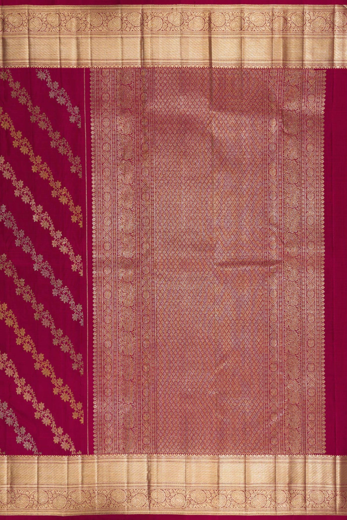 Close up image of the pallu of Pure Silk Maroon Kanchipuram Saree with Zari Brocade on the body and Zari Border. 