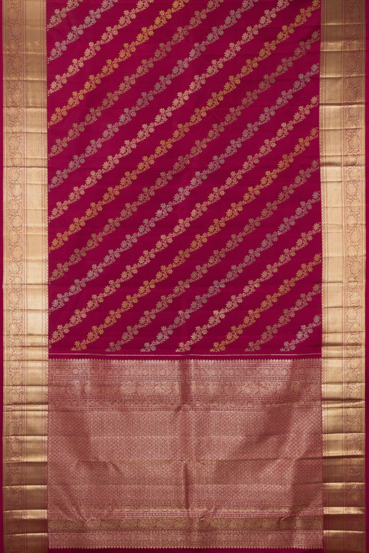 Flat view of Pure Silk Maroon Kanchipuram Saree with Zari Brocade on the body and Zari Border. 