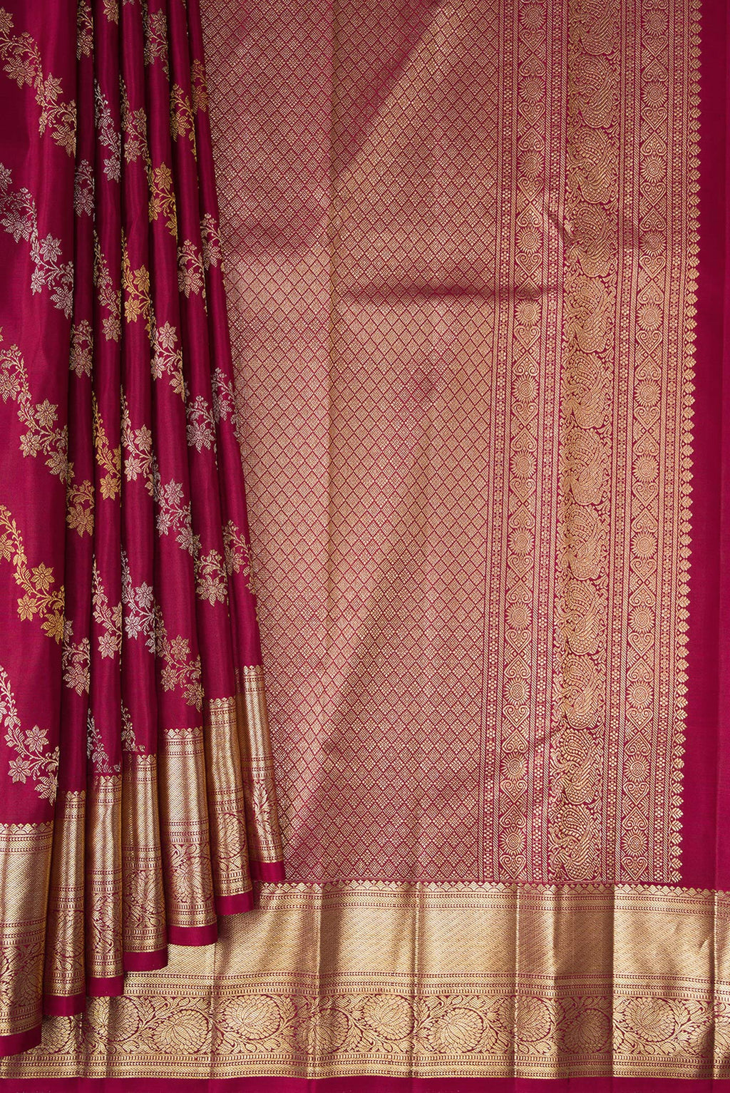 Pleats and pallu of Pure Silk Maroon Kanchipuram Saree with Zari Brocade on the body and Zari Border. 