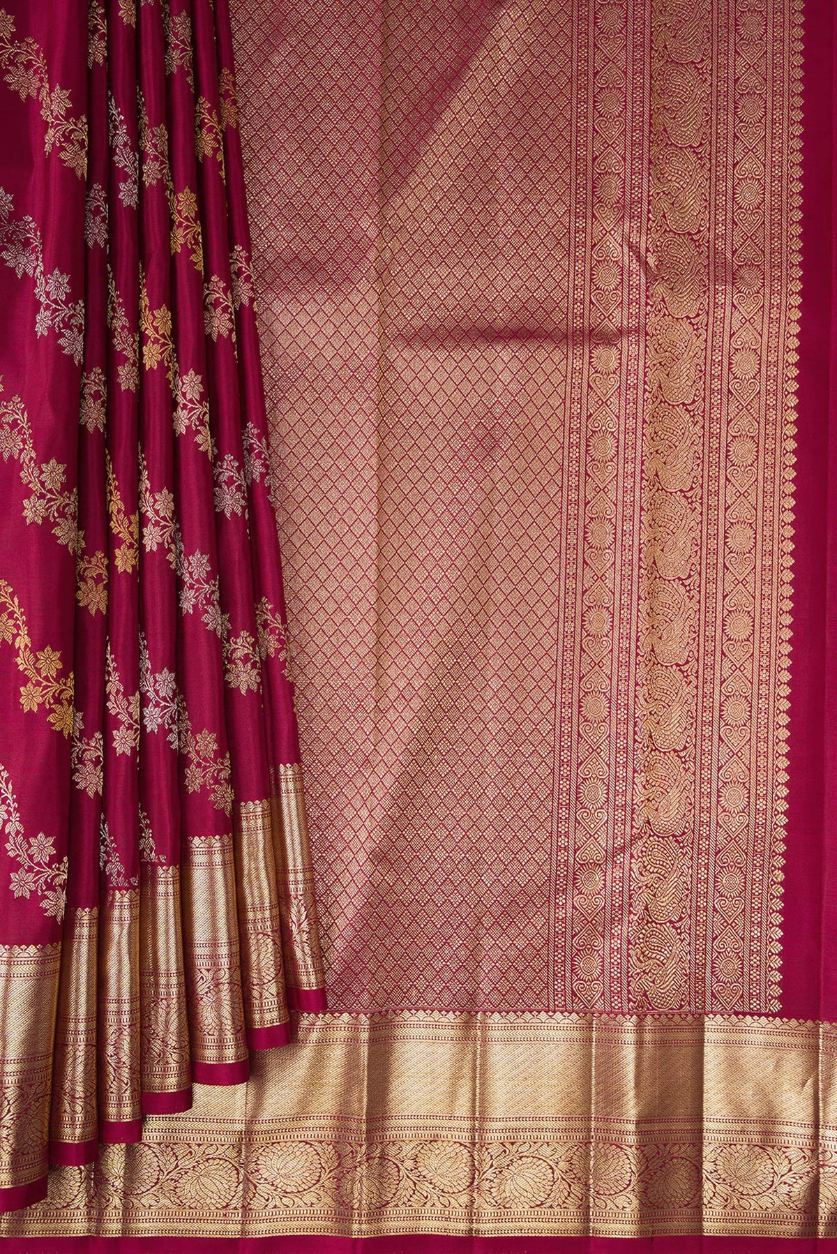 Pleats and pallu of Pure Silk Maroon Kanchipuram Saree with Zari Brocade on the body and Zari Border. 