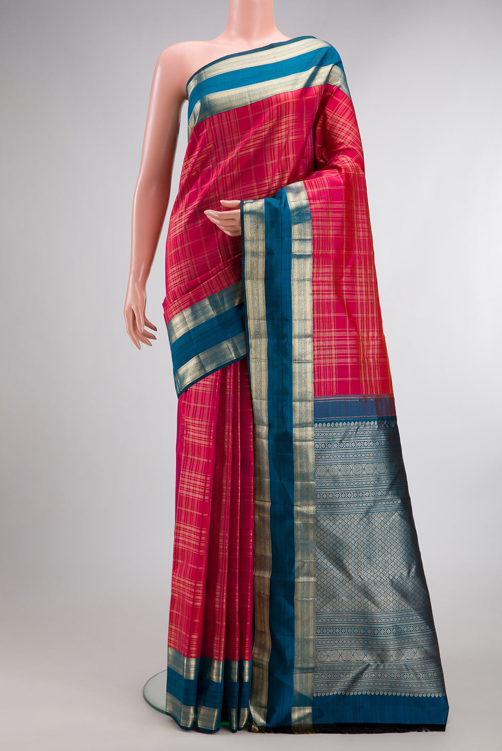Pure Silk Dark Pink Kanchipuram Saree with Checked design on the body and Zari Border.  displayed on a mannequin
