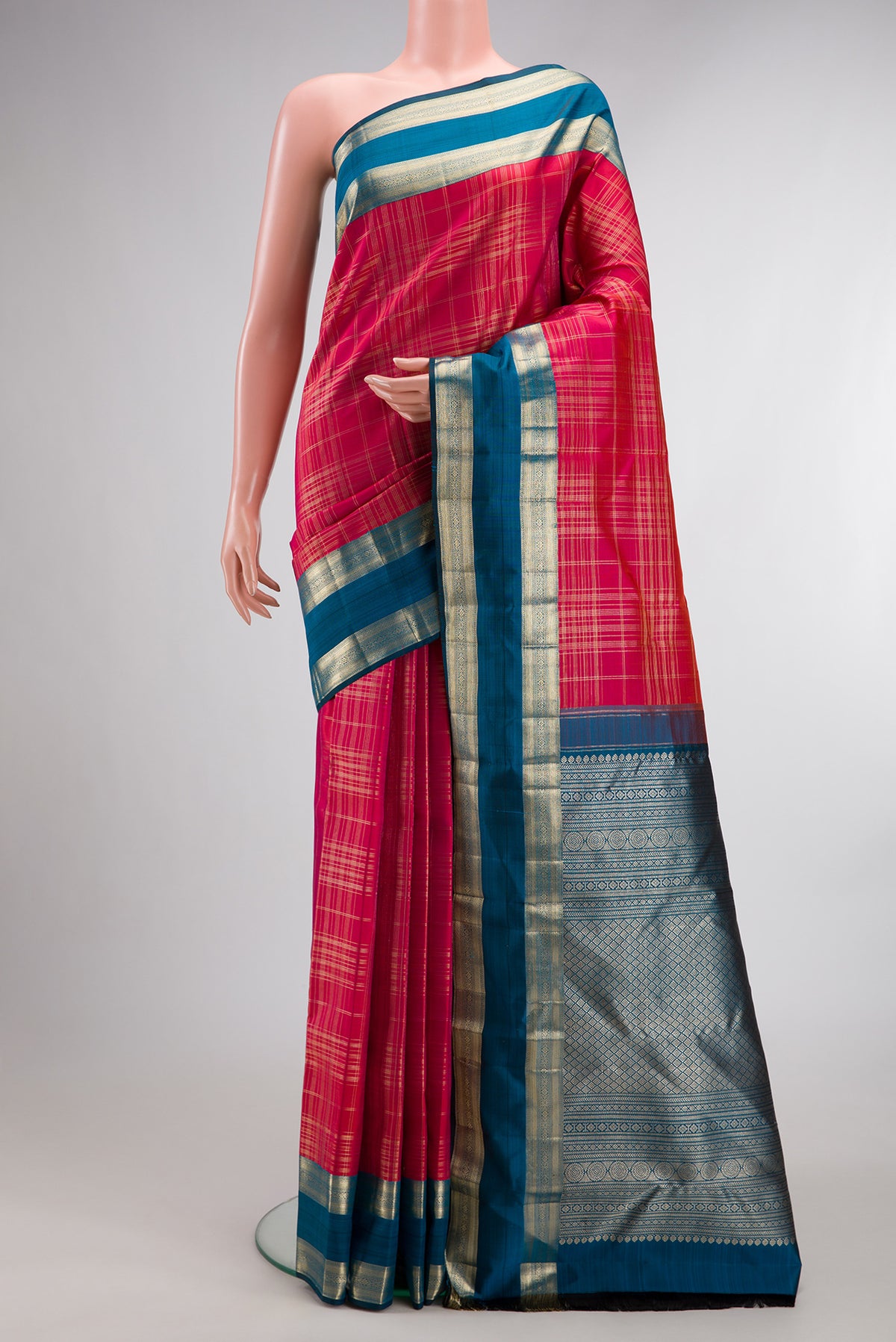 Pure Silk Dark Pink Kanchipuram Saree with Checked design on the body and Zari Border.  displayed on a mannequin