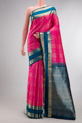 Pure Silk Pink Kanchipuram Saree with Checked design on the body and Zari Border.  displayed on a mannequin